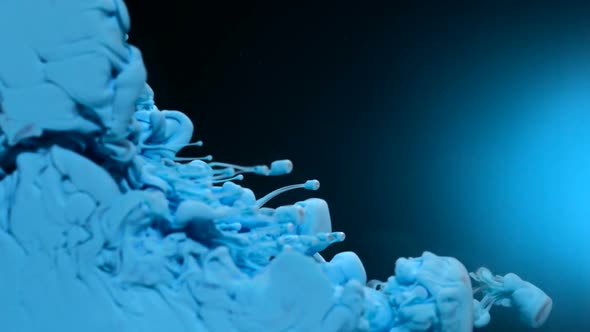 Blue ink dissolving in water, Slow Motion