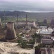 Aerial drive view of decommissioned nuclear power plant - VideoHive Item for Sale