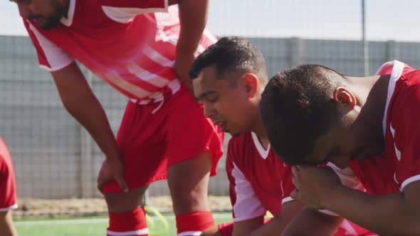 Soccer players tired after training on field