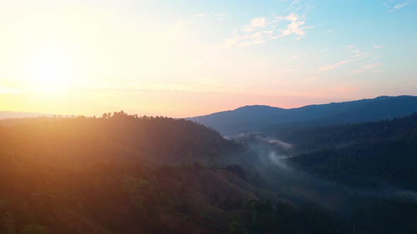 4K Aerial view over beautiful mountains. beautiful sunset over high mountains
