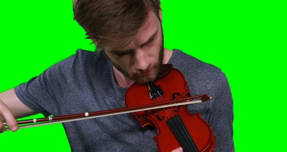 Close-up of male musician playing violin