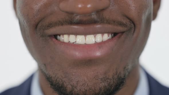 Close Up of Smiling Lips of African Man