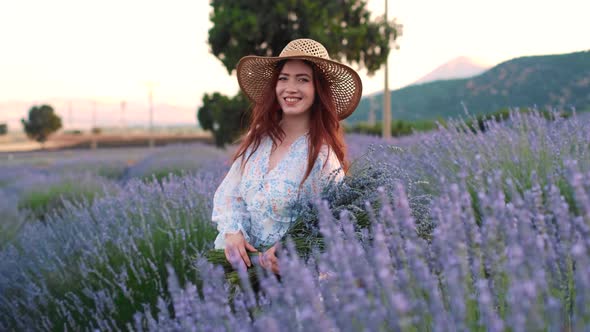 Tourist Woman in Lavender Flowers Field