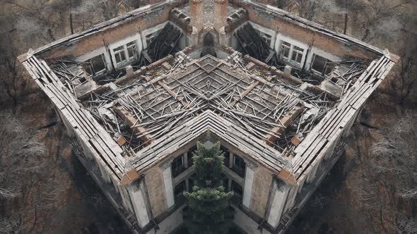 Large Abandoned House Without Roof in Forest on Cloudy Day