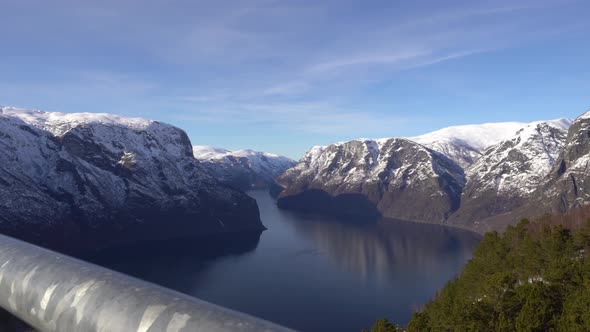 Magnificent panoramic view over Aurlandsfjord in Sognefjorden Norway - Railing of Stegastein vewpoin