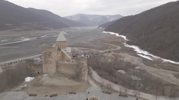 Aerial view of old Ananuri Fortress with two churches and picturesque view on river. Georgia 2021