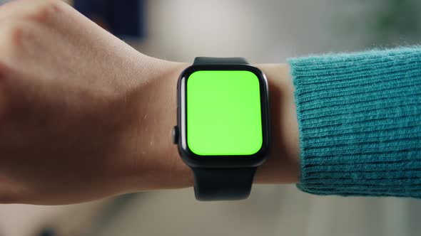 Woman Using Smartwatch with Chroma Key Closeup