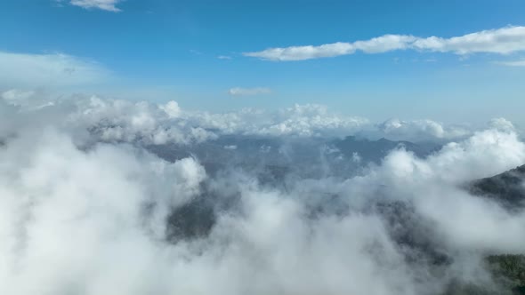 Cloudy landscape high in the mountains aerial view 4 K