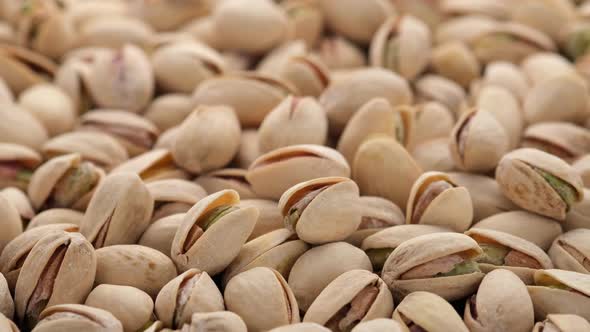 salt pistachios close up rotation. Pistachio in the peel. Whole nut kernels