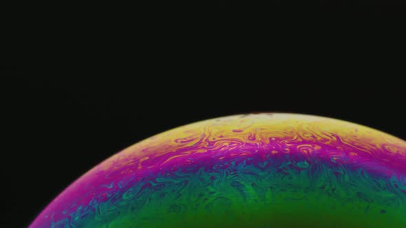 Abstract background of bright soap bubbles representing planets