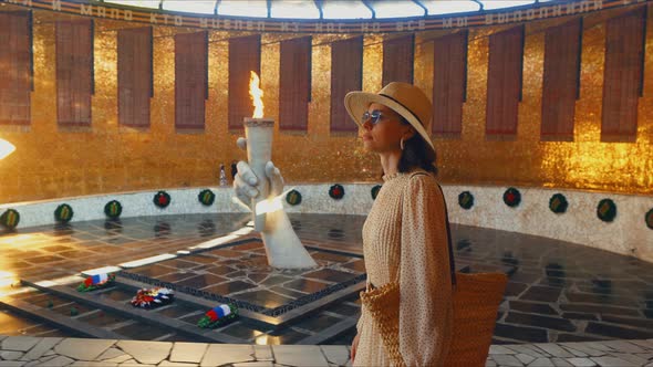 Young woman in the pantheon on Mamayev Kurgan, Volgograd