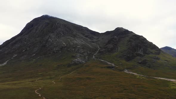 Aerial view of a cottage in a remote location of the highlands in Scotland