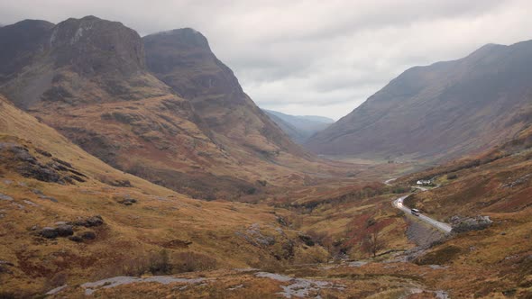 Scenic view of a road windiwng through highlands in Scotland