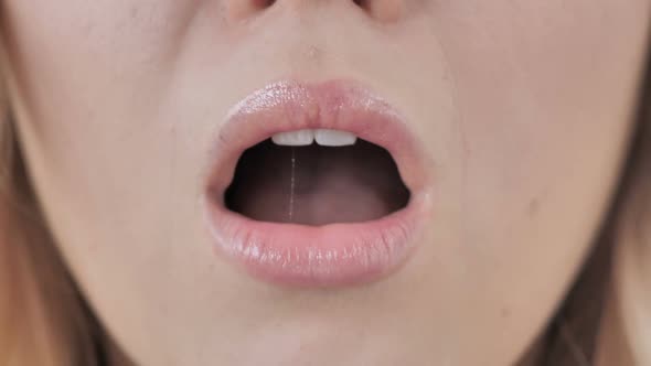 Close Up of Female Mouth in Shock Wondering