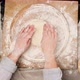 two female hands knead dough from white wheat flour  - VideoHive Item for Sale