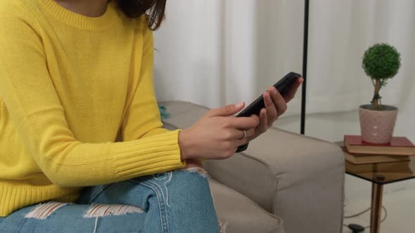 Caucasian woman using her phone