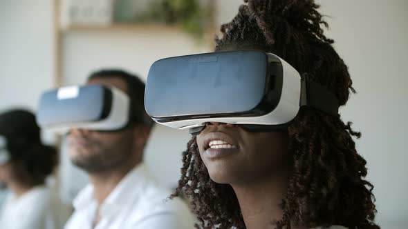 Closeup Shot of Smiling Woman Experiencing VR Headset.