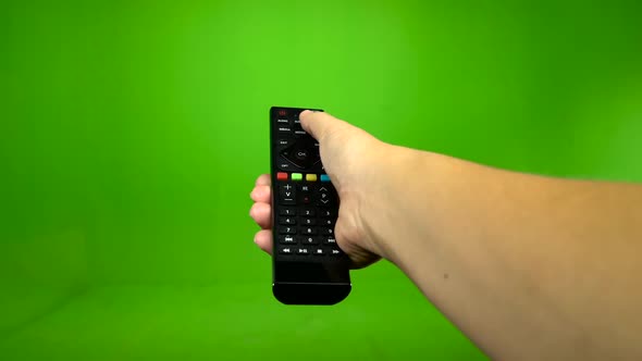 Black Remote Control Television Changing One Channel . Green Screen