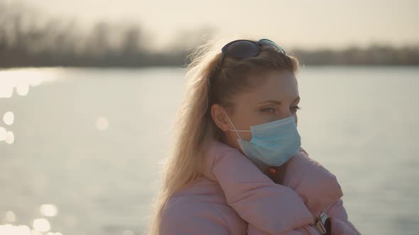 Girl Walking In Protective Mask COVID19 Virus. Health And Safety Concept. Pandemic Coronavirus.