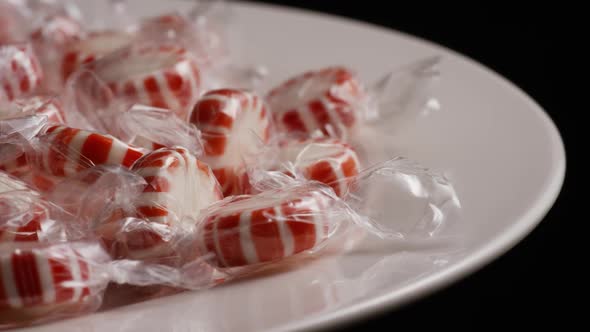 Rotating shot of peppermint candies - CANDY PEPPERMINT 015