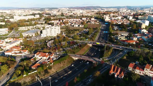 Aerial View of Freeway Intersection with Moving Traffic Cars