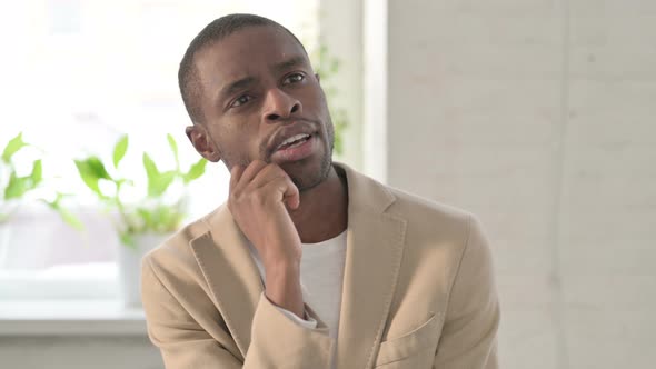 Portrait of Pensive African Man Thinking