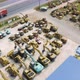 Aerial top view of new truck tractor cars parking for sale stock lot row, dealer inventory import - VideoHive Item for Sale