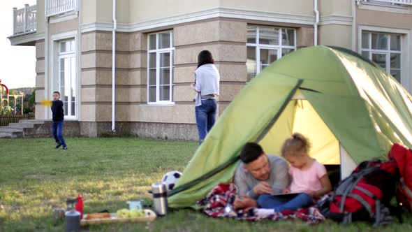 Loving Caucasian Parents Spending Time with Kids Outdoors