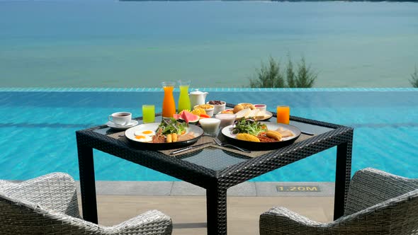 Hotel Breakfast By the Swimming Pool on Terrace with Turquoise Sea View