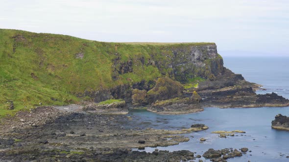 Empty cliff coast Ireland Giants causeway Northern pan right