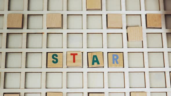 Colourful Wooden Square Letters Creating a Word START