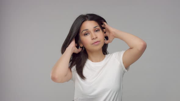 Young Mixed Race Woman in Studio in Casual Look