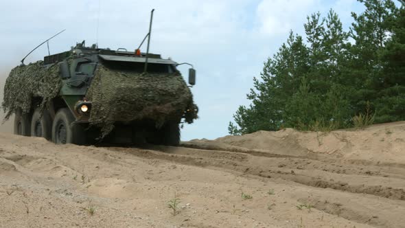 Military Armored Vehicle Offroad Driving on Sand