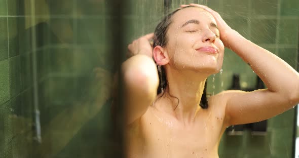 Woman Taking a Rain Shower