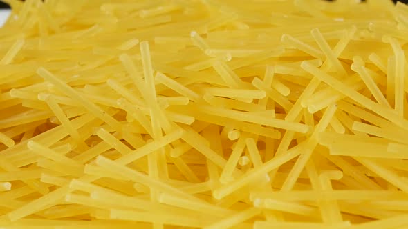 Spaghetti - yellow pasta, ready for cooking.