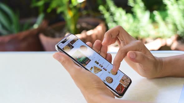 Closeup Hand Of Women Using Smartphone.