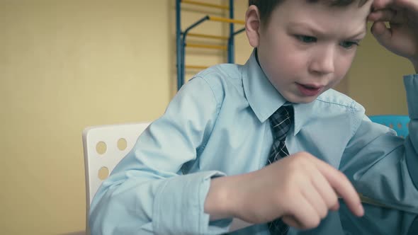 CU Tracking Pupil Works on Tablet Computer Does Lessons Flips Through Pages Thinks Solves the