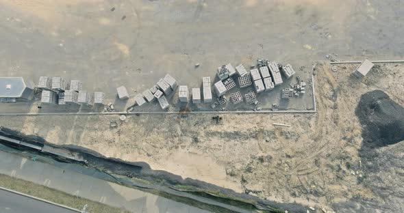 Top view on industrial zone from above of storage place construction materials