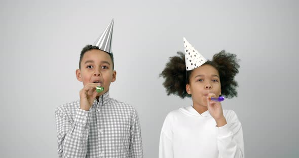 Black Kids Celebrating Birthday Over White Background