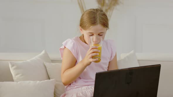 Girl Drinking Orange Juice