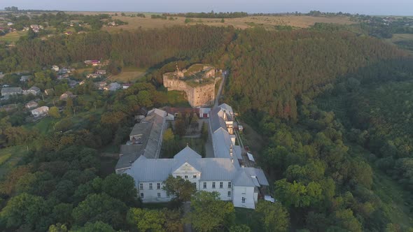 Aerial of a hill with buildings and ruins