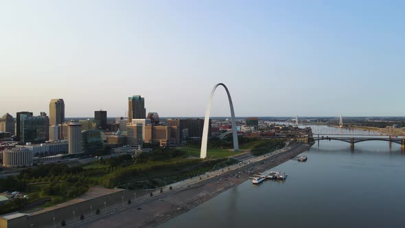 Metropolis Concept - Amazing Futuristic Architecture of St. Louis Arch in Downtown City, Aerial Dron