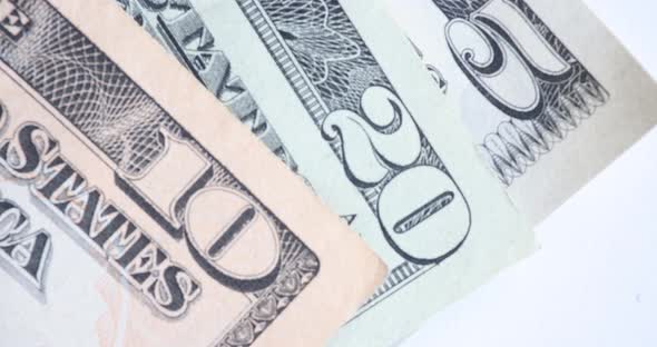 Stopmotion Macro of Fast Changing Fragments of Dollar Bills