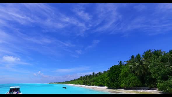 Aerial drone scenery of luxury sea view beach adventure by aqua blue sea with clean sandy background