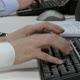 Two businessmen using computer keyboards - VideoHive Item for Sale