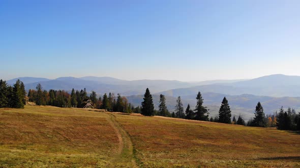 Flight over autumn mountains.