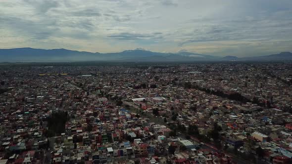 Aerial drone shot of Mexico city and Popocateptl