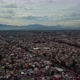 Aerial drone shot of Mexico city and Popocateptl - VideoHive Item for Sale