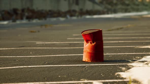 Old and Rusty Metal Barrel on Parking