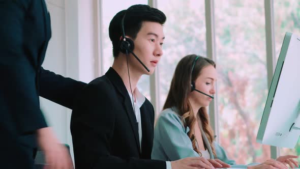 Business People Wearing Headset Working in Office